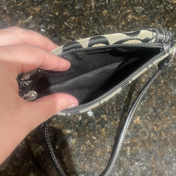 Coach Wristlet approximately 7.5 inches long by 5 inches wide. Good condition. - Picture 6 of 6